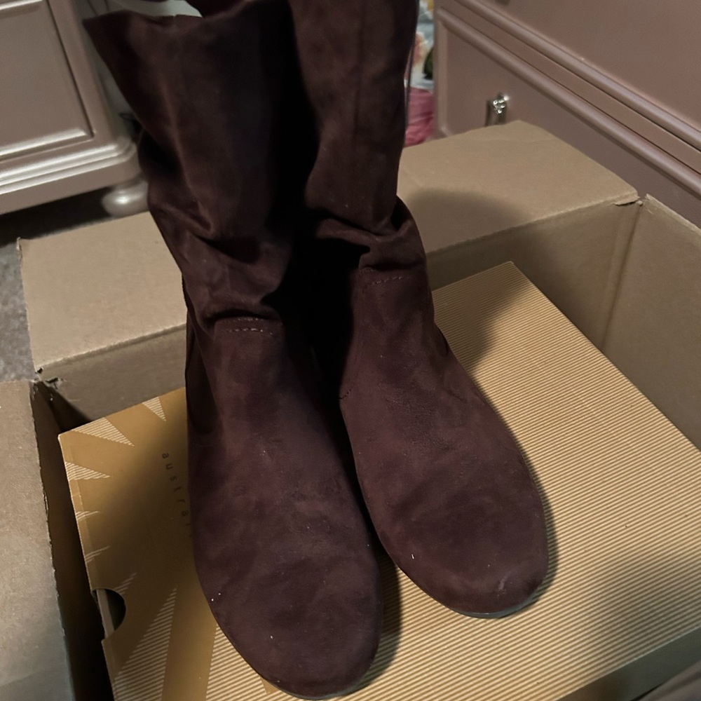 Cute slouchy flat boot.